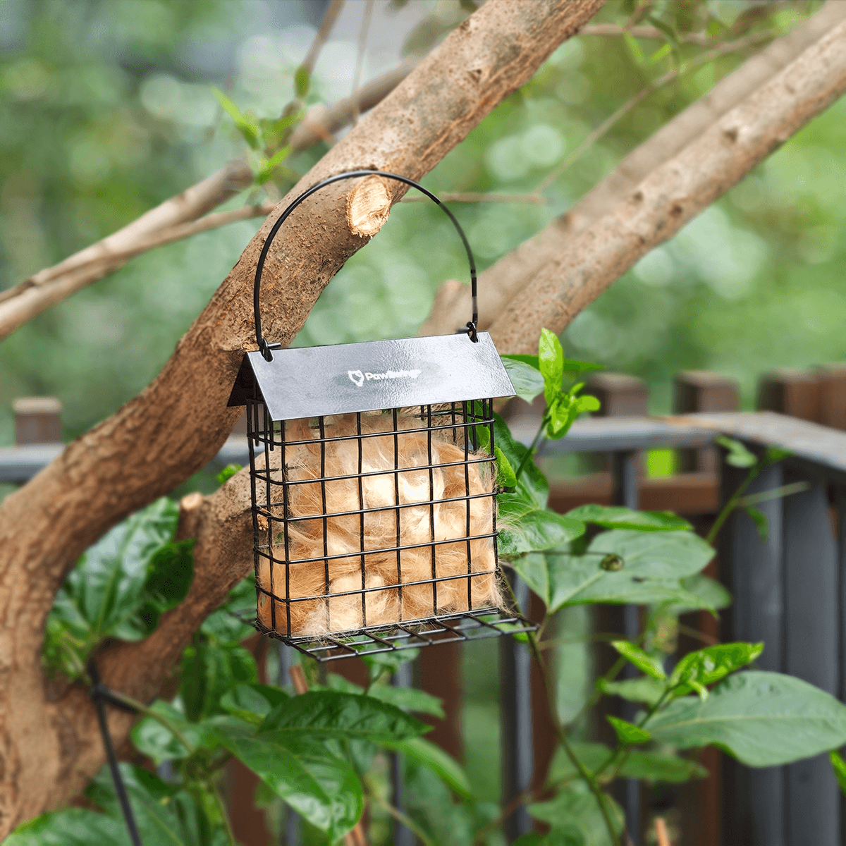 Bird-friendly PawSwing® cat hair cage placed outdoors to encourage sustainable garden wildlife support