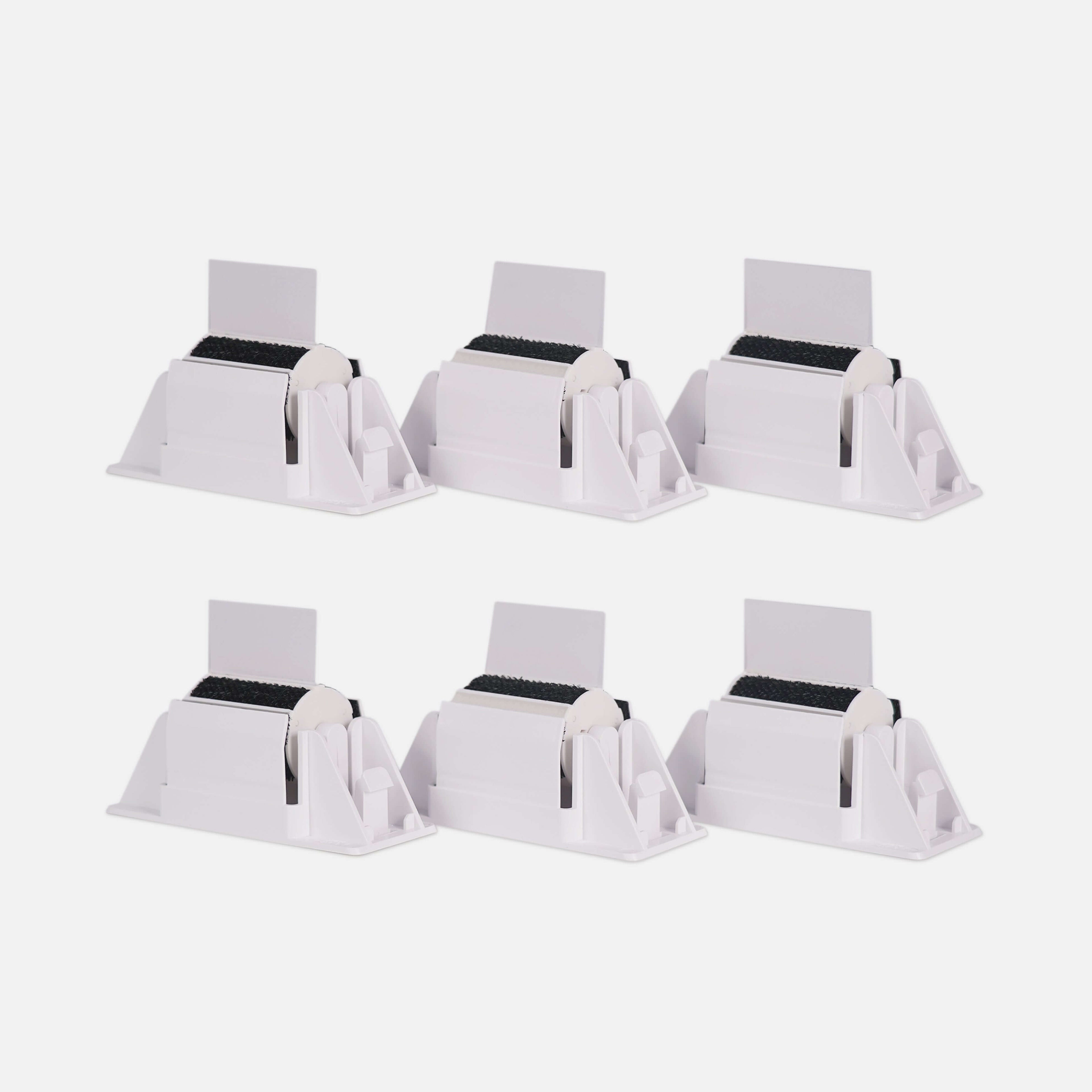 A set of six PawSwing® cat brush modules arranged to show the durable felt grooming surface