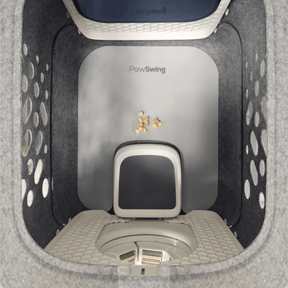 Grey PawSwing® cat food mat showing how it catches crumbs and treats inside the cat house