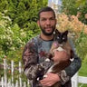 cat owner holding cat