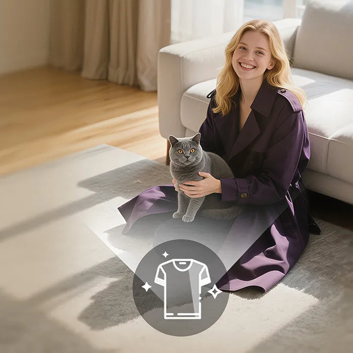 A happy owner with hair-free clothes thanks to the PawSwing®, the best cat brush for reducing shedding in the home