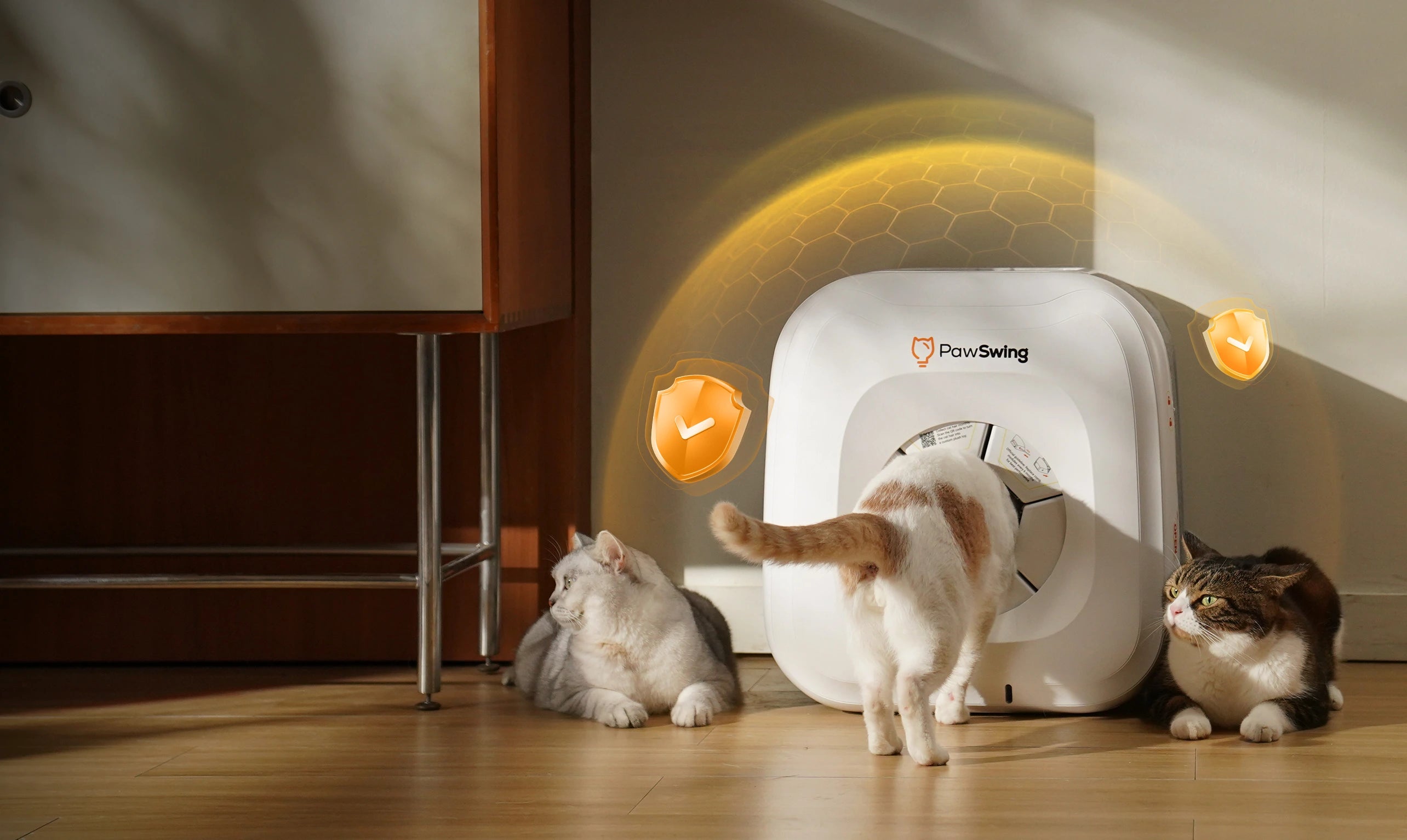 Three cats lounging safely around the protective PawSwing® neo self grooming cat house